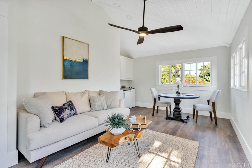 1864 Sunset Boulevard San Diego, CA 92103 - Photo 45 of 57 a living room with furniture and a wooden floor