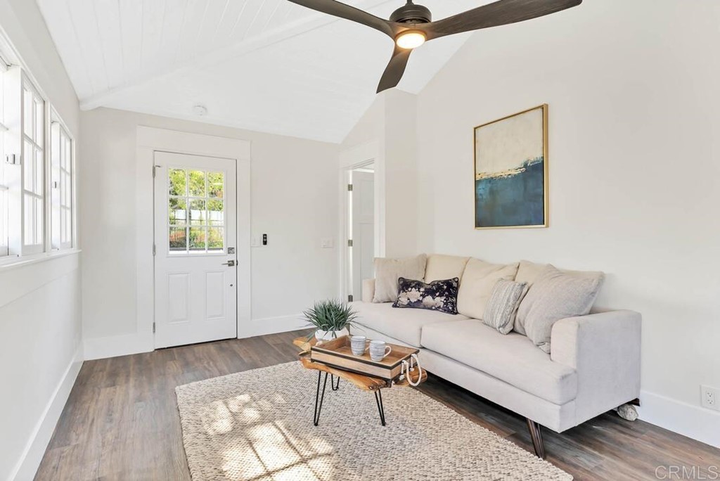 1864 Sunset Boulevard San Diego, CA 92103 - Photo 46 of 57 a living room with furniture and a wooden floor
