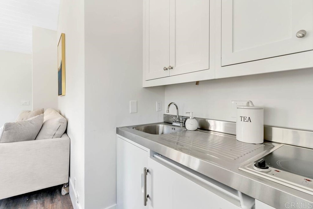 1864 Sunset Boulevard San Diego, CA 92103 - Photo 47 of 57 a kitchen with sink and cabinets