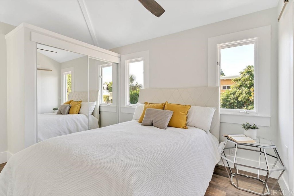 1864 Sunset Boulevard San Diego, CA 92103 - Photo 49 of 57 a bedroom with a bed and a large window