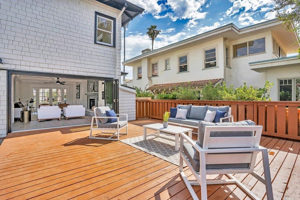 1864 Sunset Boulevard San Diego, CA 92103 - Photo 52 of 57 a view of a patio with couches chairs and wooden floor