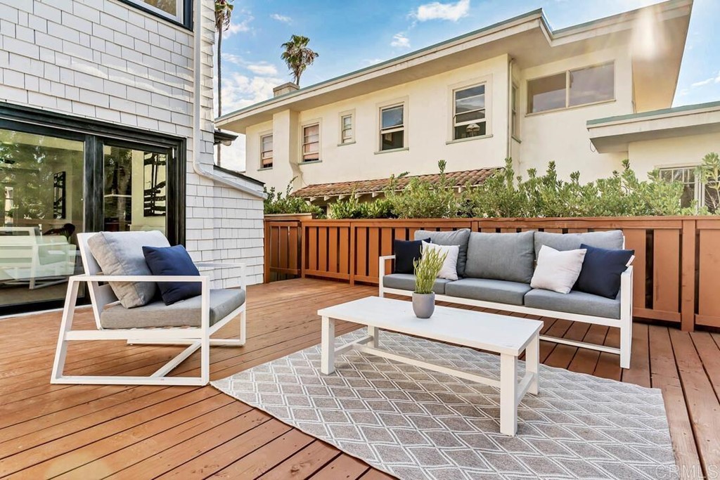 1864 Sunset Boulevard San Diego, CA 92103 - Photo 53 of 57 a outdoor space with patio the couches and a dining table with the kitchen view