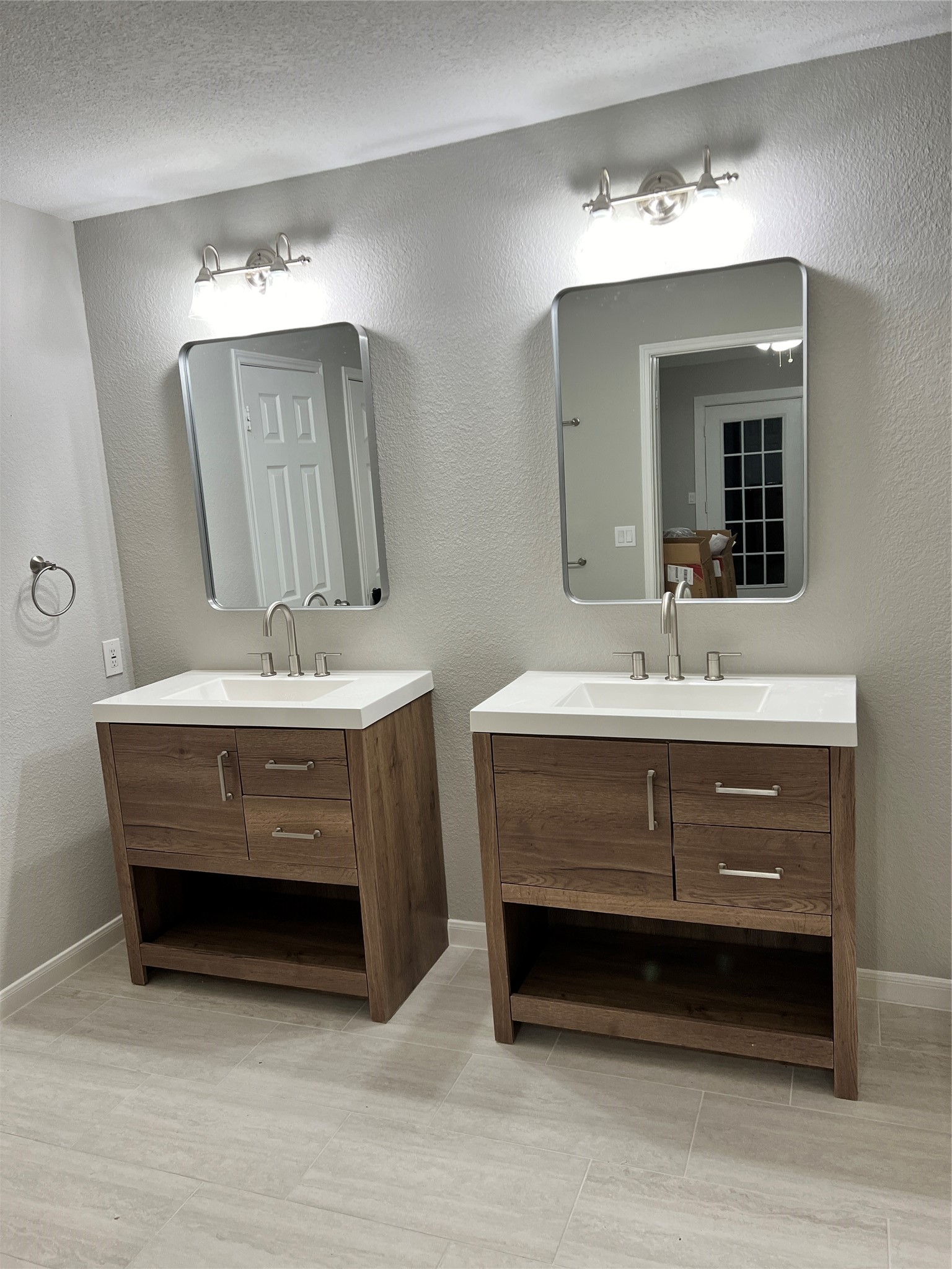 75 East Village Knoll Circle Spring, TX 77381 - Photo 23 of 33 a bathroom with a sink double vanity and a mirror