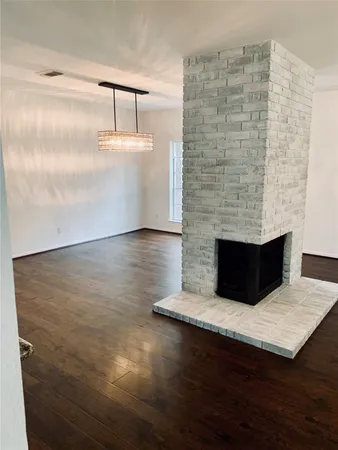 a living room with a fireplace