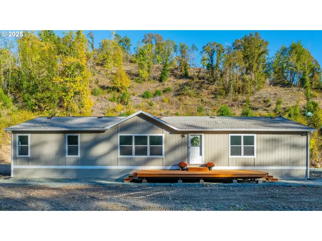 a aerial view of a house with a swimming pool