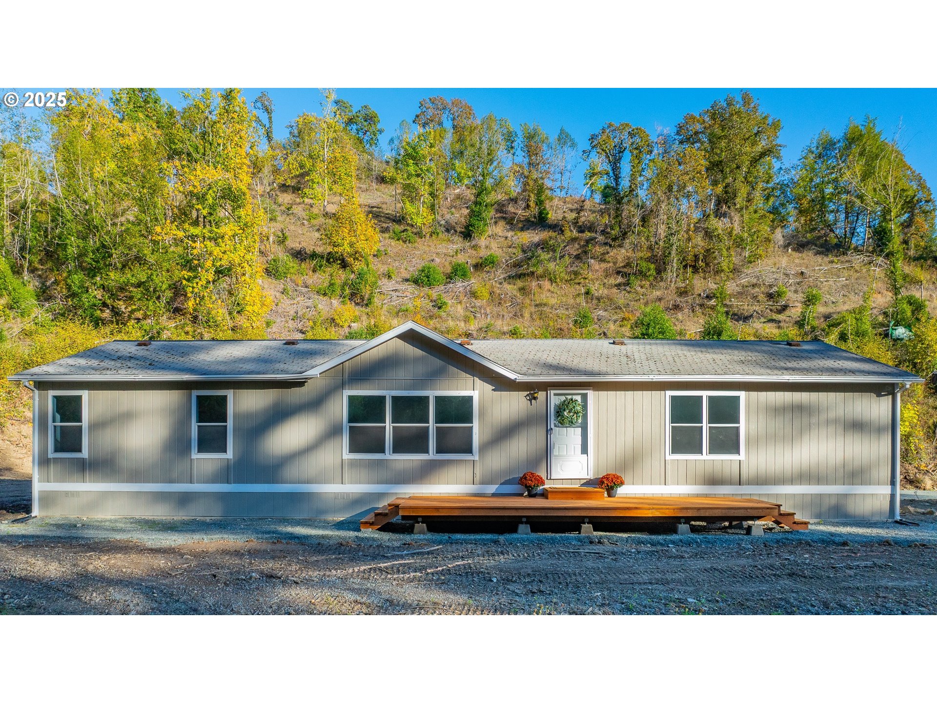 20191 Highway 42 Myrtle Point, OR 97458 - Photo 33 of 41 a aerial view of a house with a swimming pool