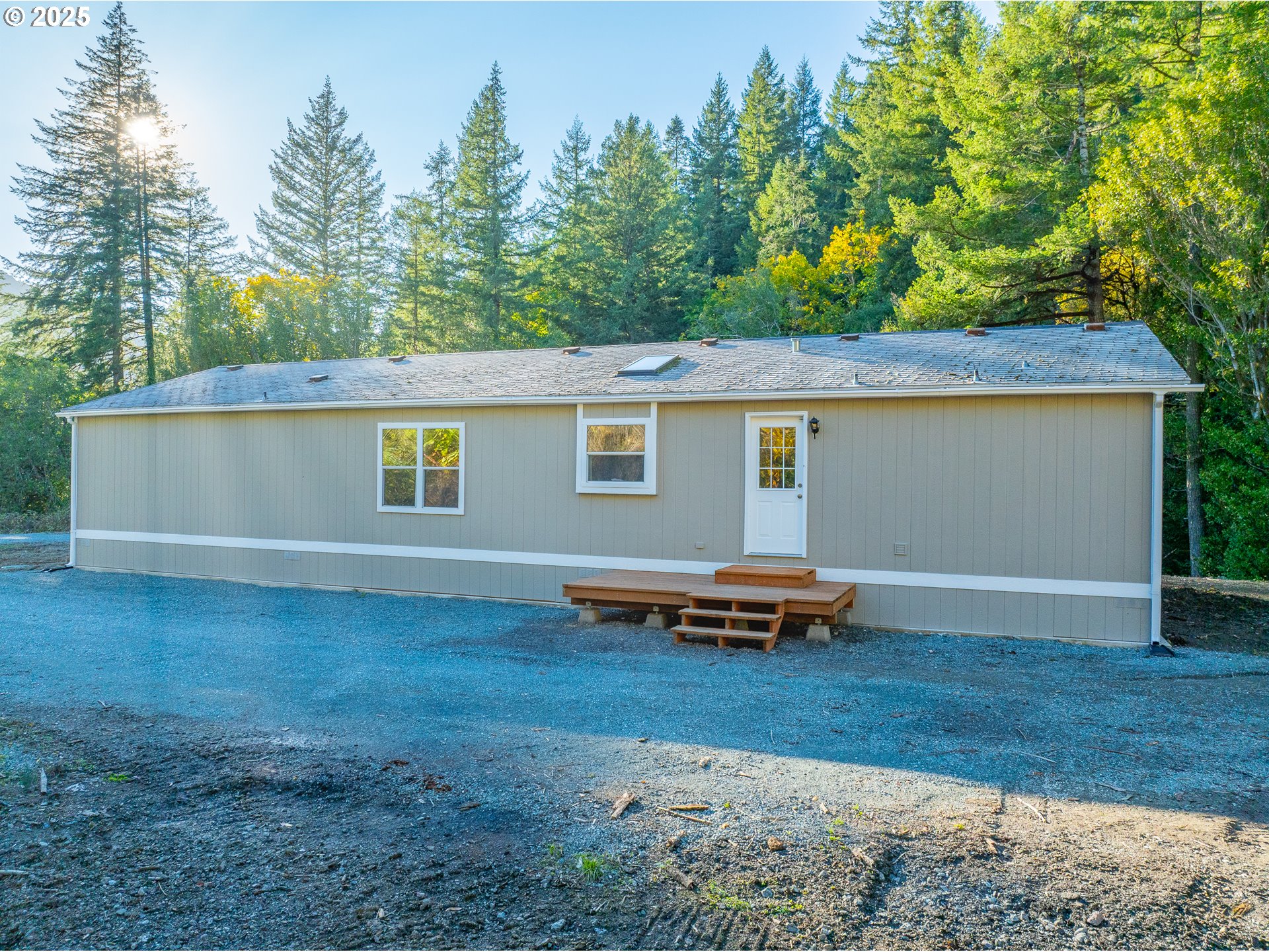 20191 Highway 42 Myrtle Point, OR 97458 - Photo 39 of 41 an outdoor view of house with backyard