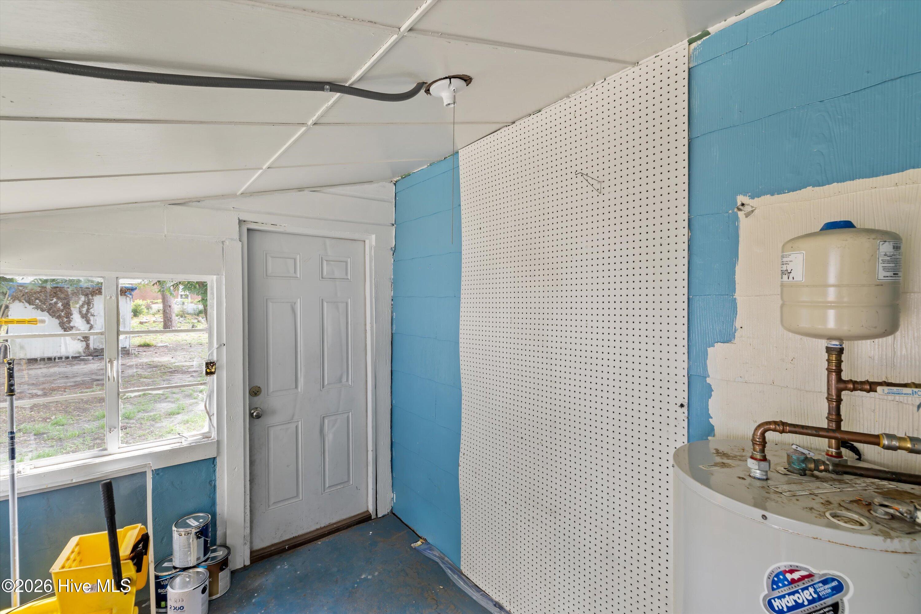 2122 Sanders Road Augusta, GA 30906 - Photo 29 of 31 enclosed laundry porch off kitchen with access to back yard