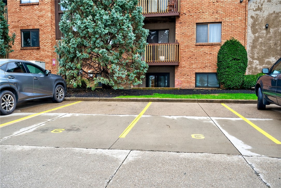 3151 Roesch Boulevard, Unit 6 Fairfield, OH 45014 - Photo 28 of 29 This multifamily residence features a classic brick exterior, offering comfortable living with convenient outdoor parking.