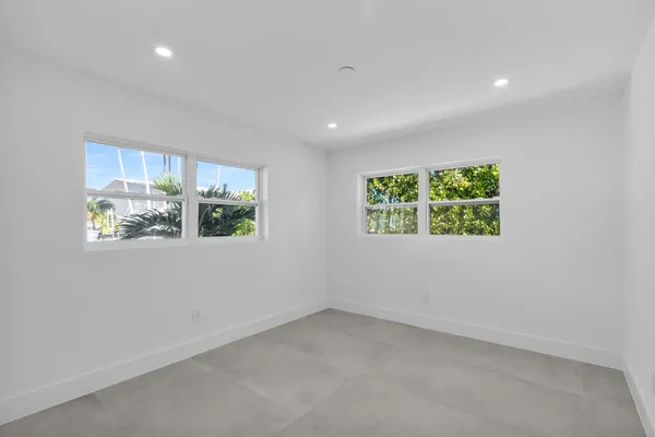 an empty room with windows