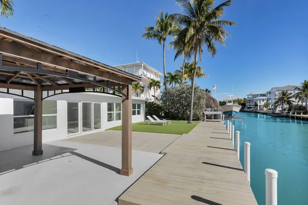 a house with river in front of it