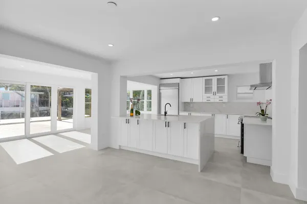 a spacious bathroom with a bathtub and a shower
