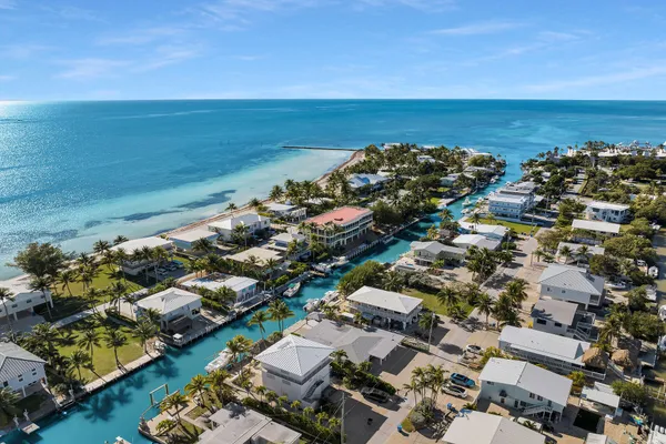 an aerial view of beach and ocean