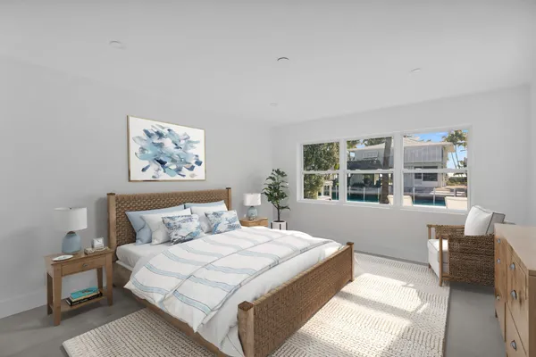 a bedroom with bed and a window