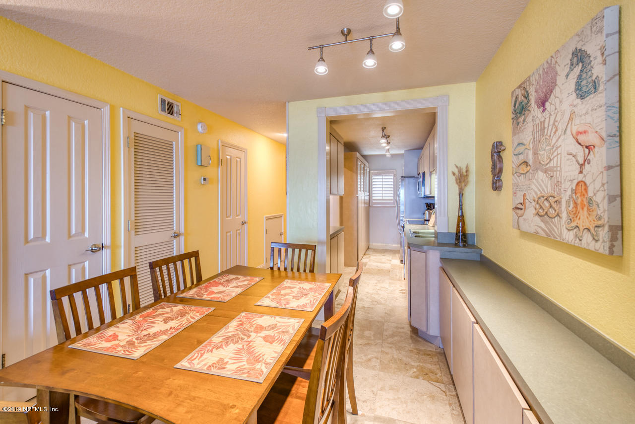 8550 A1A South, Unit 408 St. Augustine, FL 32080 - Photo 11 of 33 a spacious bathroom with a tub and shower