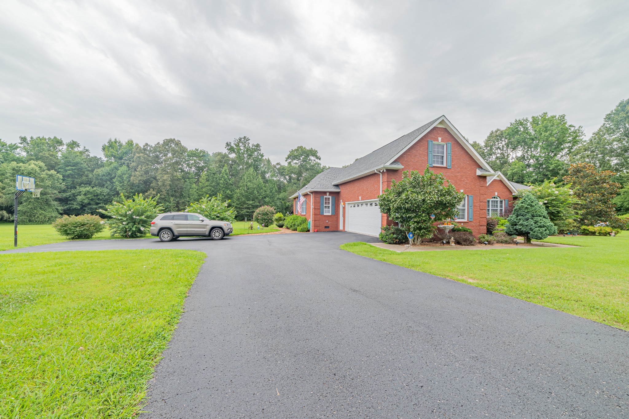 2828 Bains Road Hillsboro, TN 37342 - Photo 15 of 50 a front view of a house with garden