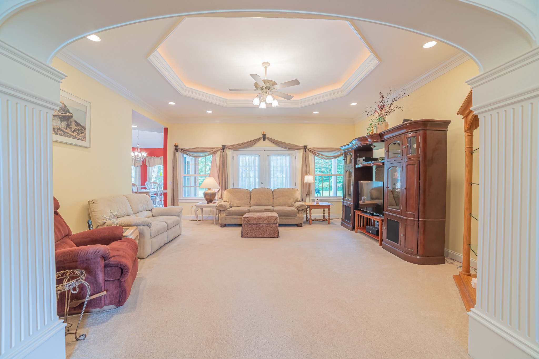 2828 Bains Road Hillsboro, TN 37342 - Photo 18 of 50 a living room with furniture a chandelier and a flat screen tv