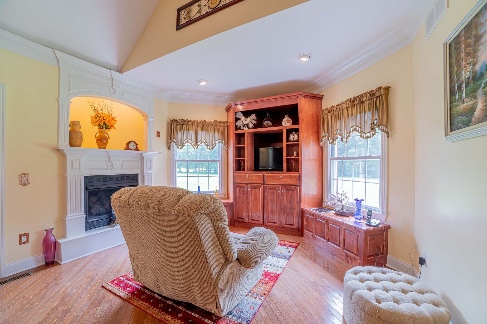2828 Bains Road Hillsboro, TN 37342 - Photo 28 of 50 a living room with furniture a fireplace and a window