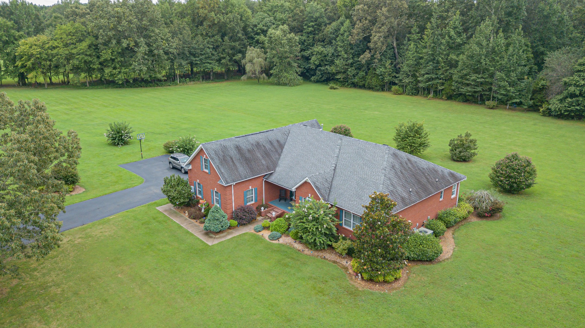 2828 Bains Road Hillsboro, TN 37342 - Photo 4 of 50 a view of a garden with a lake