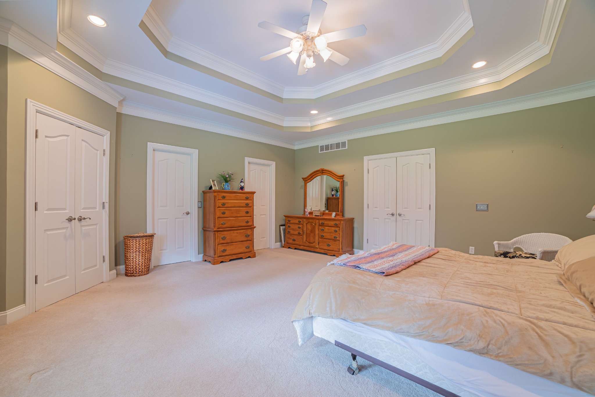 2828 Bains Road Hillsboro, TN 37342 - Photo 38 of 50 a bedroom with a bed and a chandelier