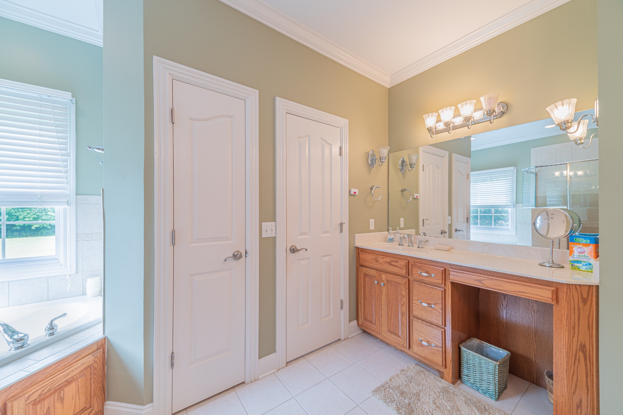2828 Bains Road Hillsboro, TN 37342 - Photo 44 of 50 a spacious bathroom with a granite countertop sink and a mirror
