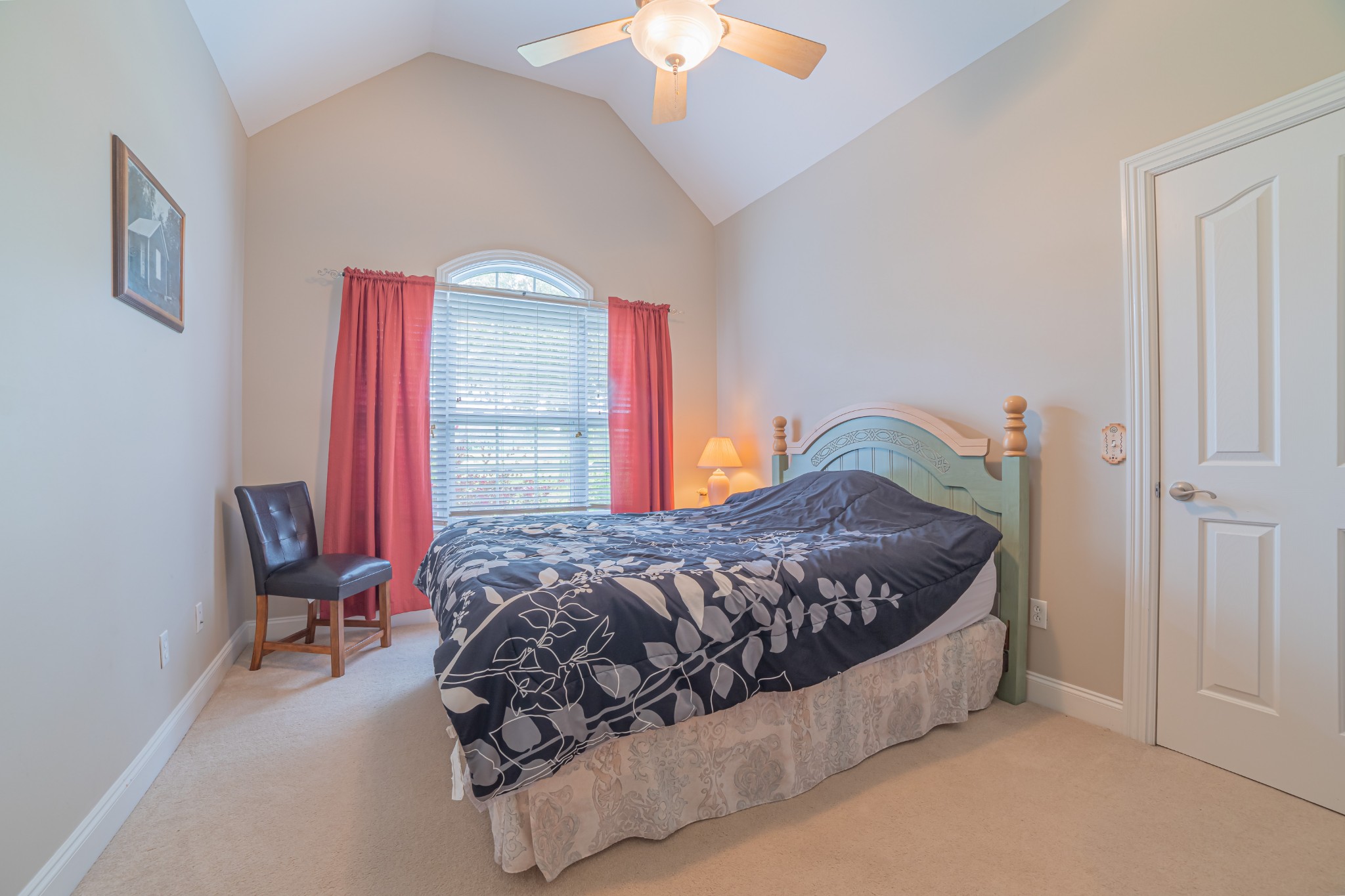 2828 Bains Road Hillsboro, TN 37342 - Photo 45 of 50 a bedroom with a bed chair and a chandelier