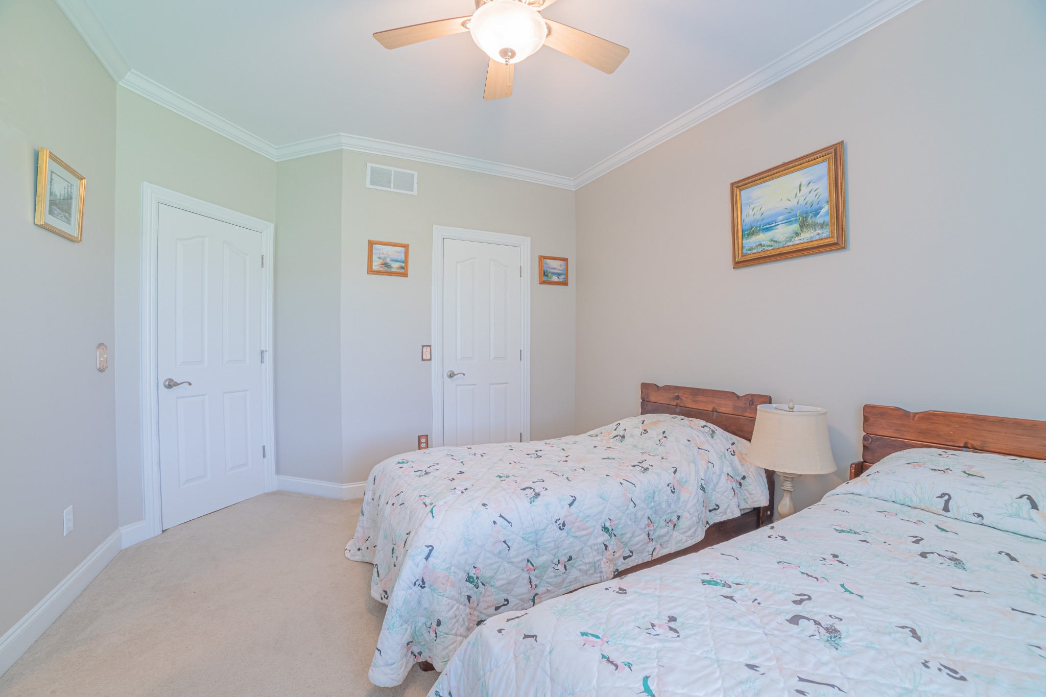 2828 Bains Road Hillsboro, TN 37342 - Photo 50 of 50 a bedroom with two beds and a chandelier
