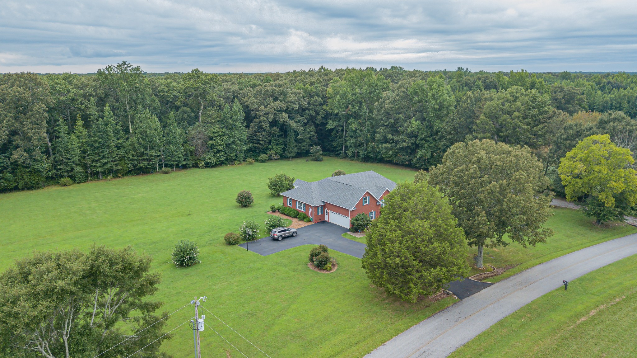 2828 Bains Road Hillsboro, TN 37342 - Photo 8 of 50 an aerial view of a golf course with parking space