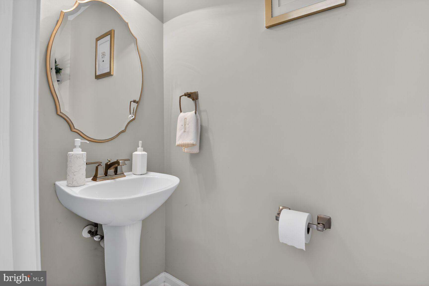 917 Rolfe Place Alexandria, VA 22314 - Photo 14 of 34 a bathroom with a sink and a mirror