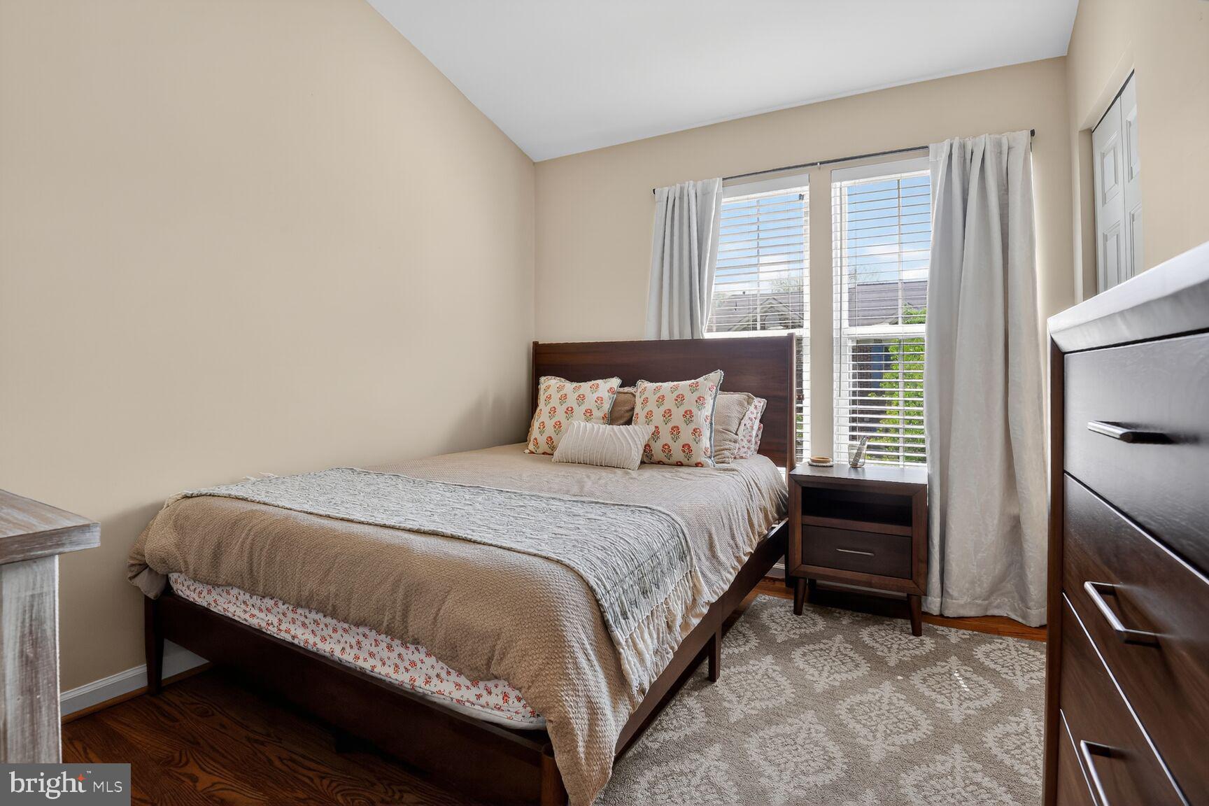 917 Rolfe Place Alexandria, VA 22314 - Photo 20 of 34 a bedroom with a bed and a window