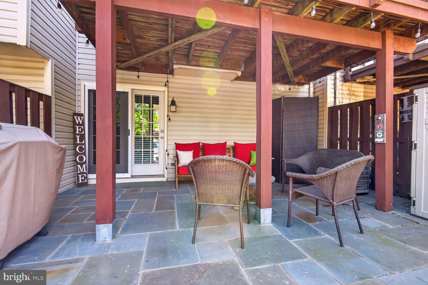 917 Rolfe Place Alexandria, VA 22314 - Photo 29 of 34 a patio with a table and chairs