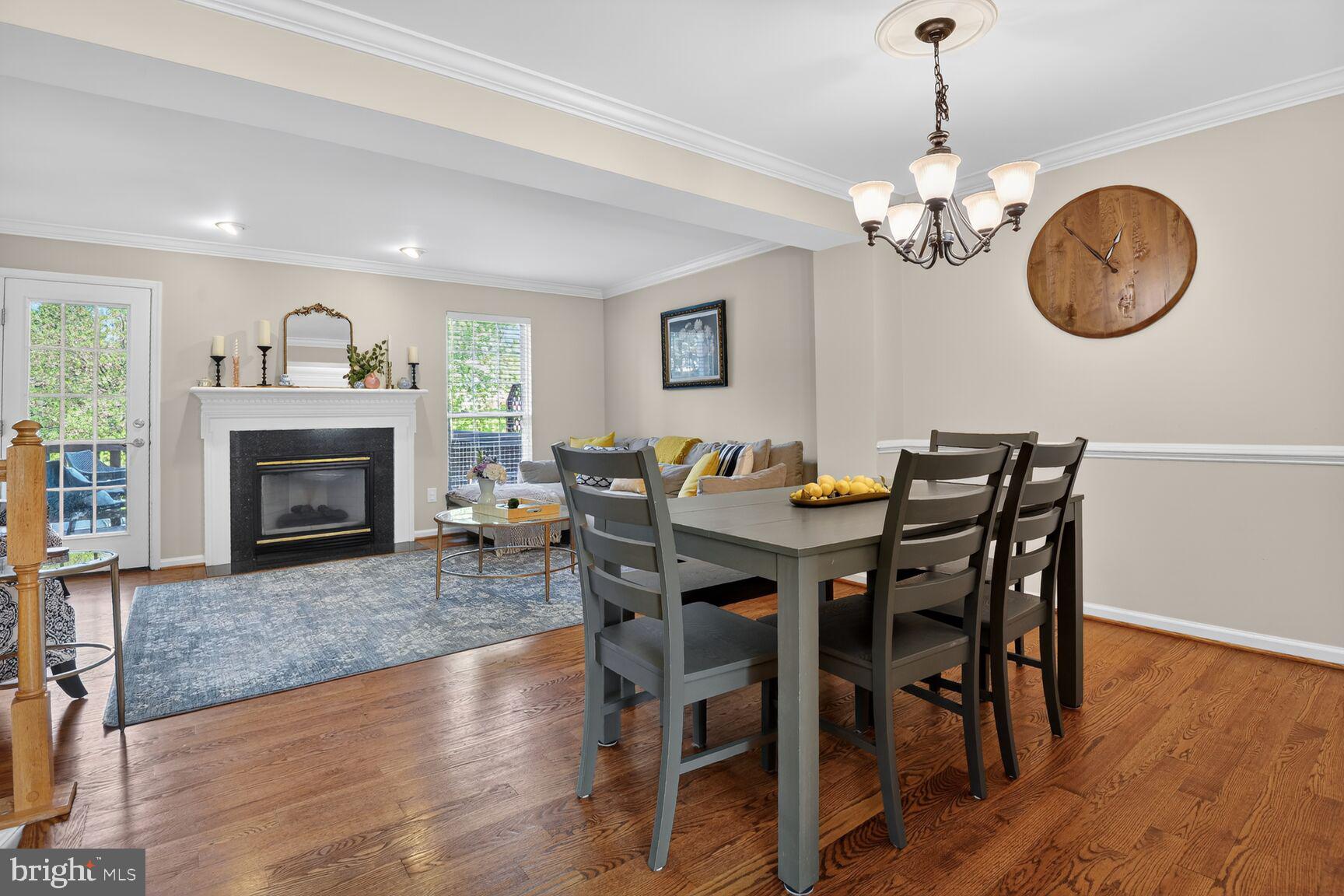 917 Rolfe Place Alexandria, VA 22314 - Photo 6 of 34 a view of a dining room with furniture wooden floor and chandelier
