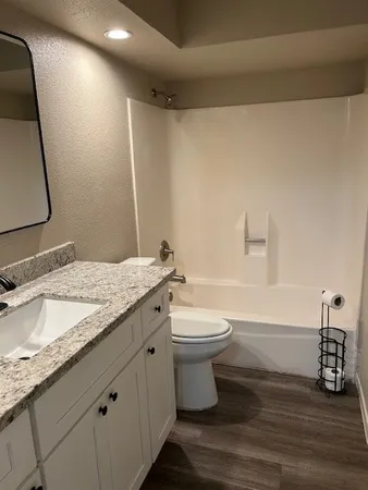 a view of a room that has a window