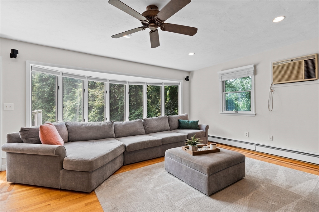 27 Pleasant Street Millis, MA 02054 - Photo 20 of 42 a living room with furniture and a large window