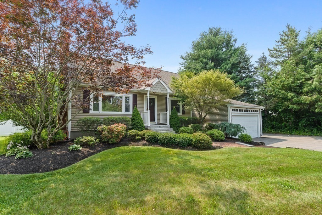 27 Pleasant Street Millis, MA 02054 - Photo 2 of 42 a front view of a house with garden