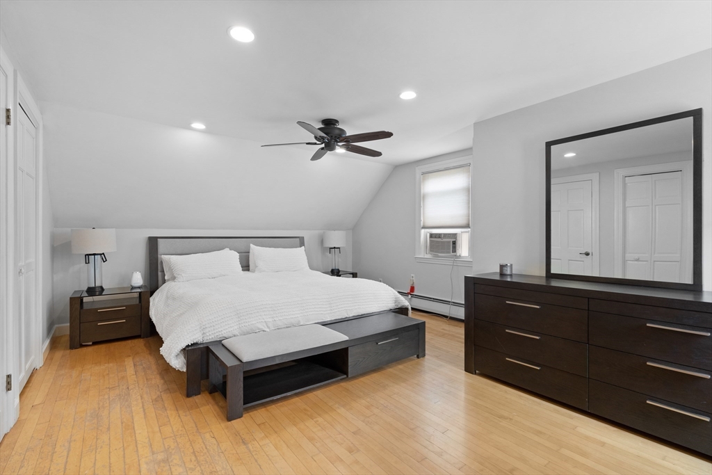 27 Pleasant Street Millis, MA 02054 - Photo 27 of 42 a bedroom with a bed and a dresser