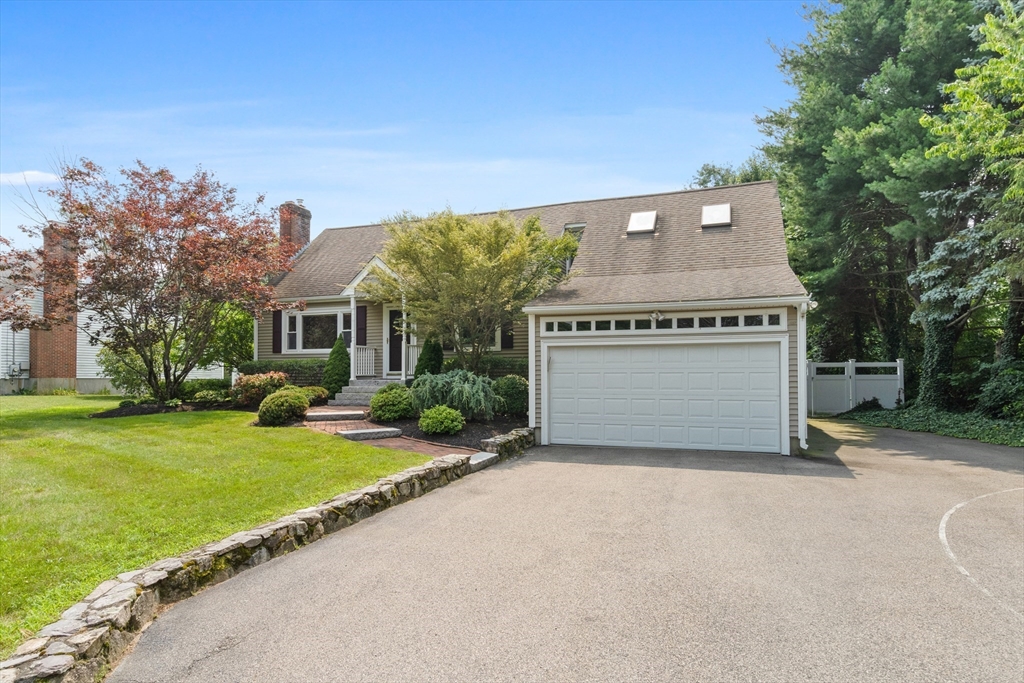 27 Pleasant Street Millis, MA 02054 - Photo 3 of 42 a view of a house with a yard and garage