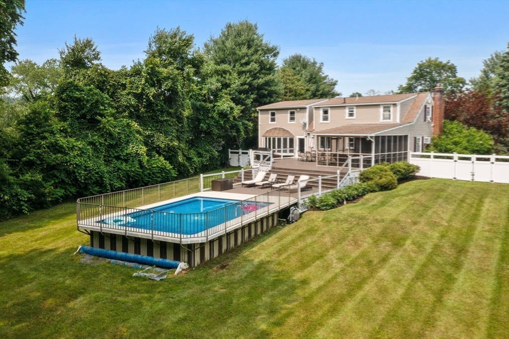 27 Pleasant Street Millis, MA 02054 - Photo 41 of 42 a view of a house with swimming pool and sitting area