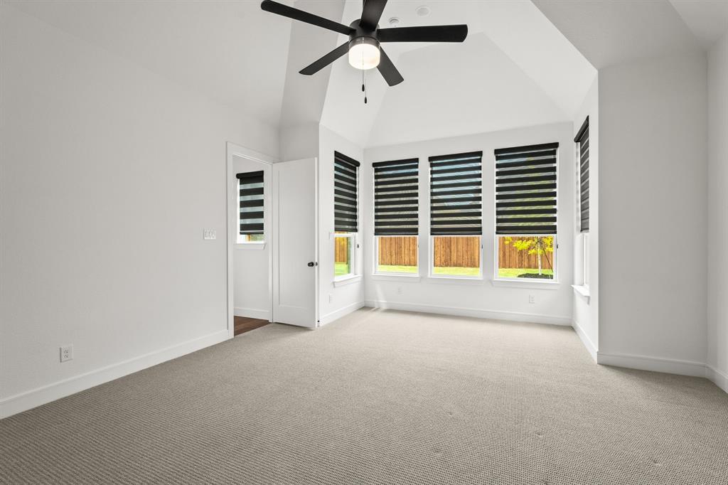 4805 Impression Lane Prosper, TX 75078 - Photo 14 of 34 a view of an empty room with a window