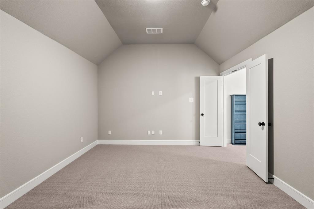 4805 Impression Lane Prosper, TX 75078 - Photo 20 of 34 a view of an empty room