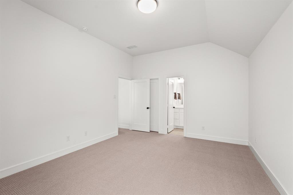 4805 Impression Lane Prosper, TX 75078 - Photo 21 of 34 a view of an empty room