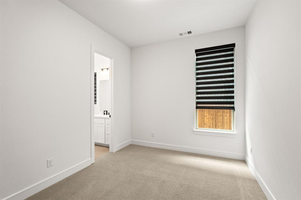 4805 Impression Lane Prosper, TX 75078 - Photo 5 of 34 an empty room with a window