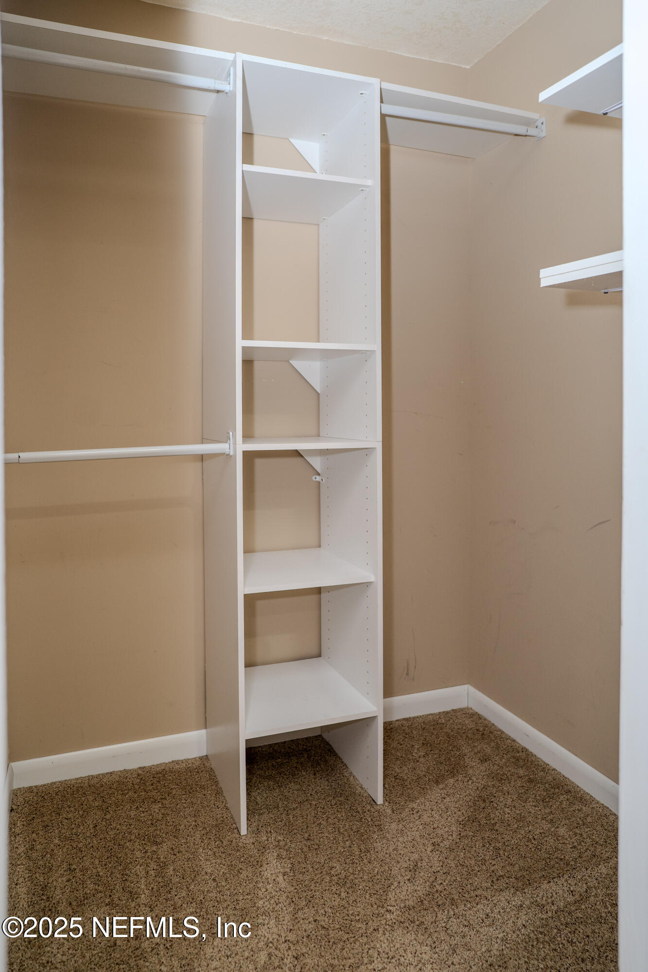 3098 Pacetti Road, Unit I St. Augustine, FL 32092 - Photo 12 of 29 a view of an empty walk in closet