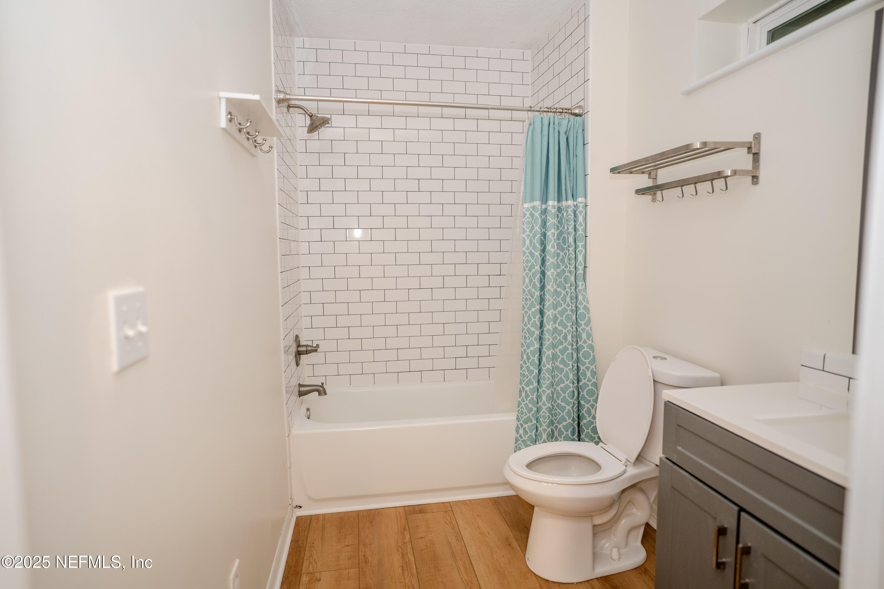 3098 Pacetti Road, Unit I St. Augustine, FL 32092 - Photo 20 of 29 a bathroom with a toilet and a shower