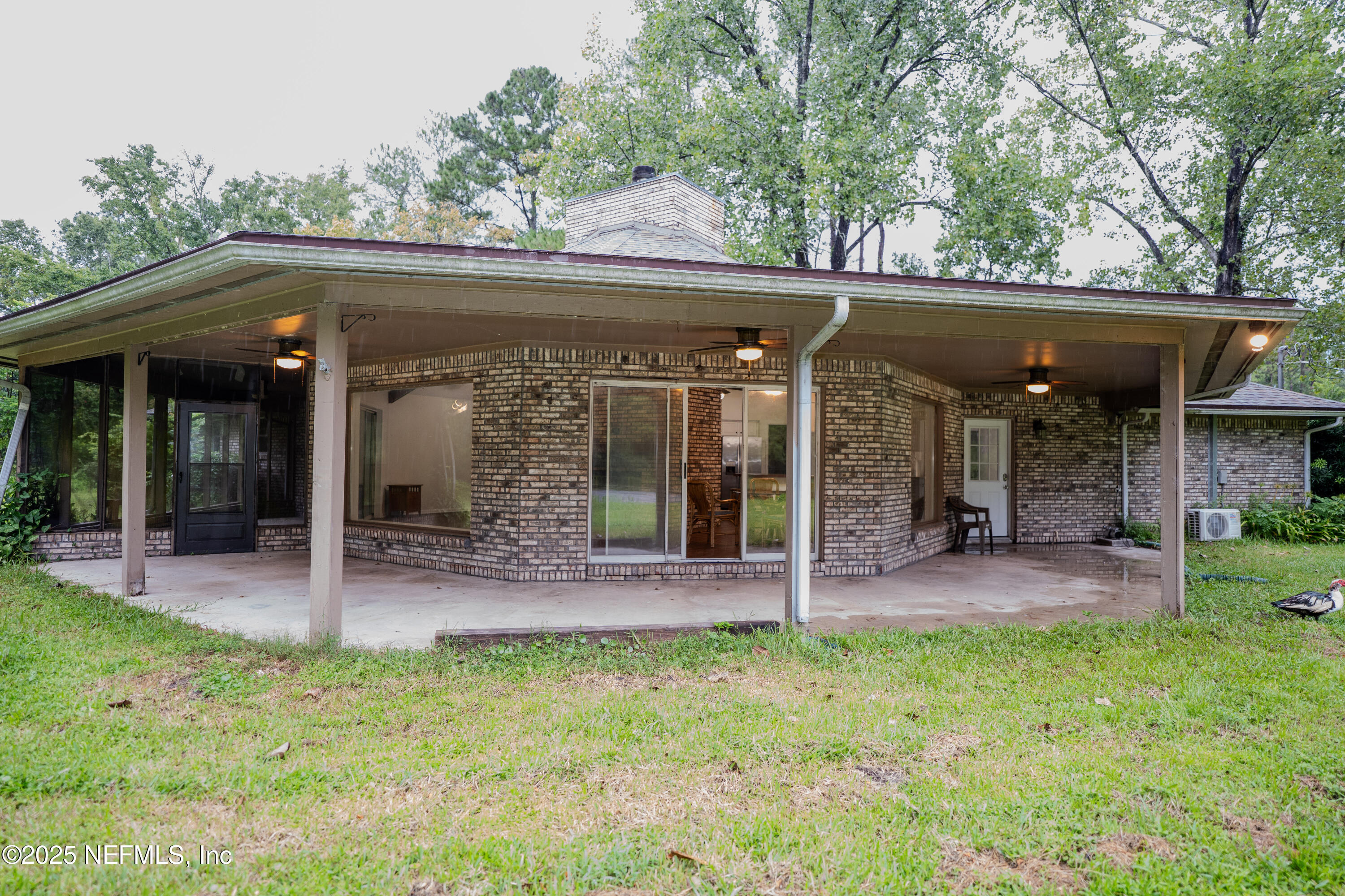 3098 Pacetti Road, Unit I St. Augustine, FL 32092 - Photo 23 of 29 front view of a house with a porch