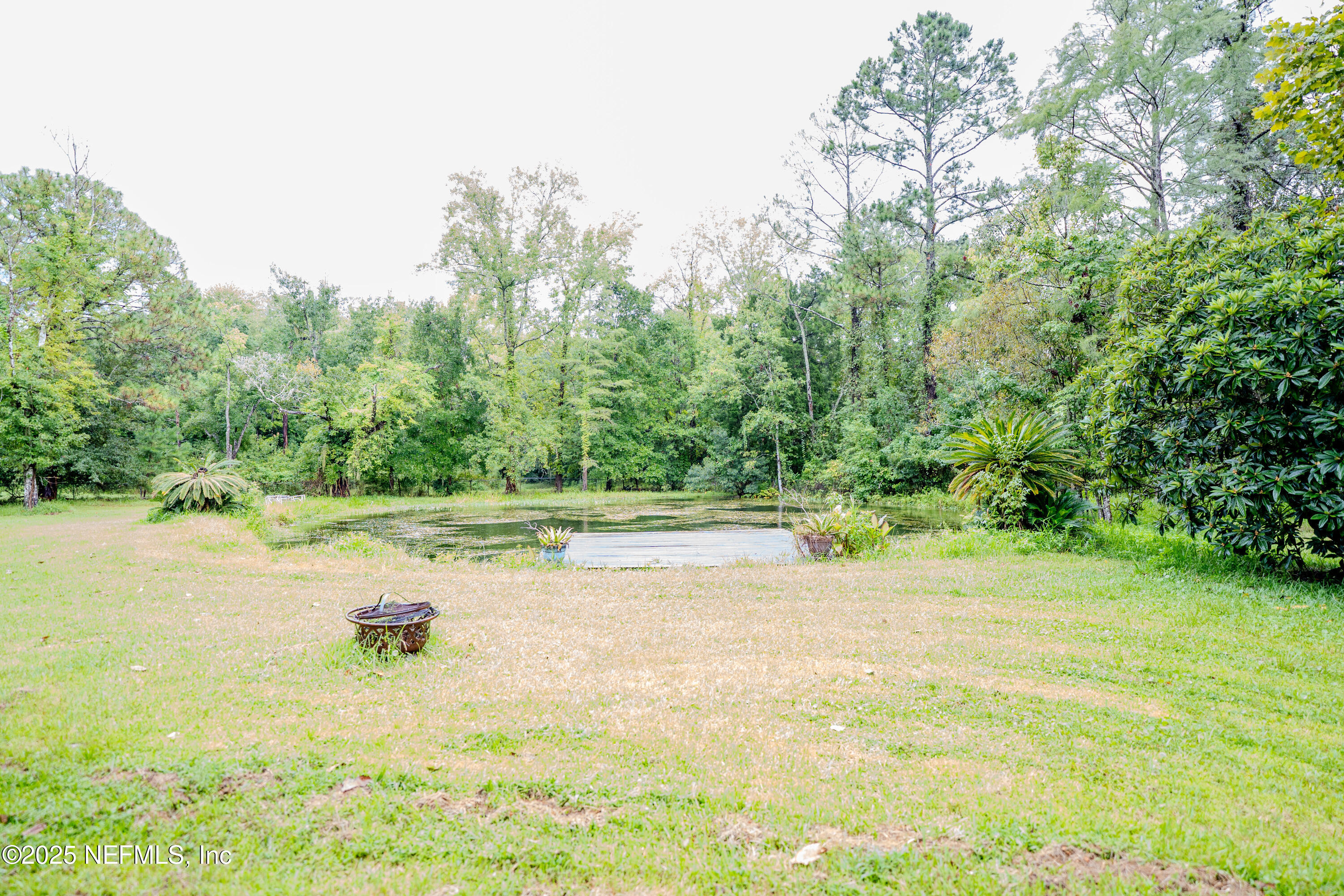 3098 Pacetti Road, Unit I St. Augustine, FL 32092 - Photo 24 of 29 a view of a lake view with a large trees