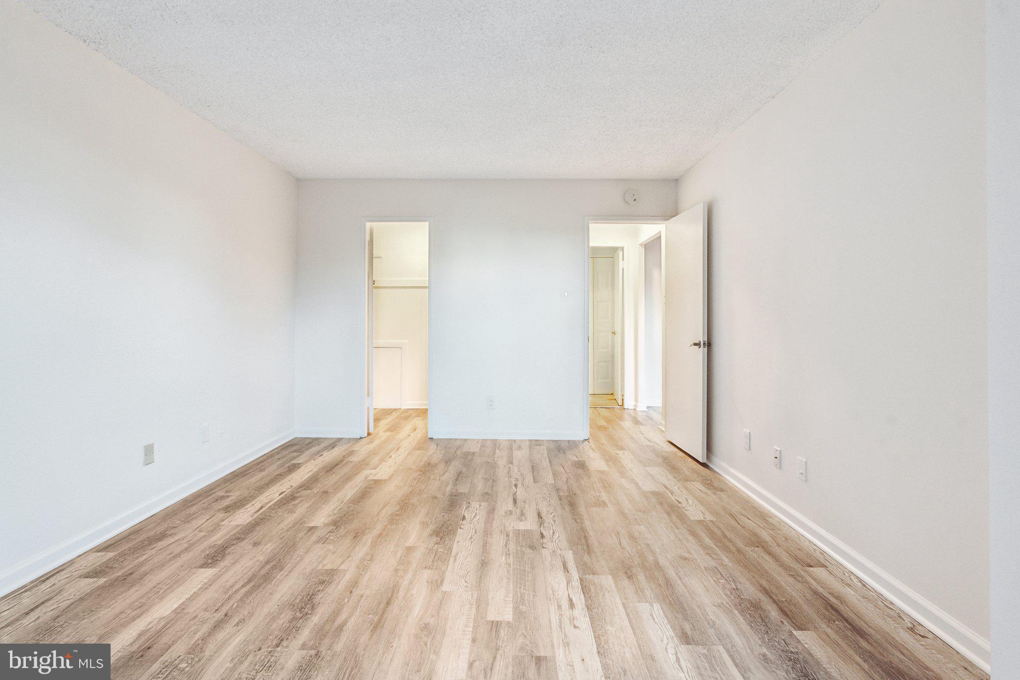1800 Old Meadow Road, Unit 115 McLean, VA 22102 - Photo 28 of 35 a view of an empty room and window