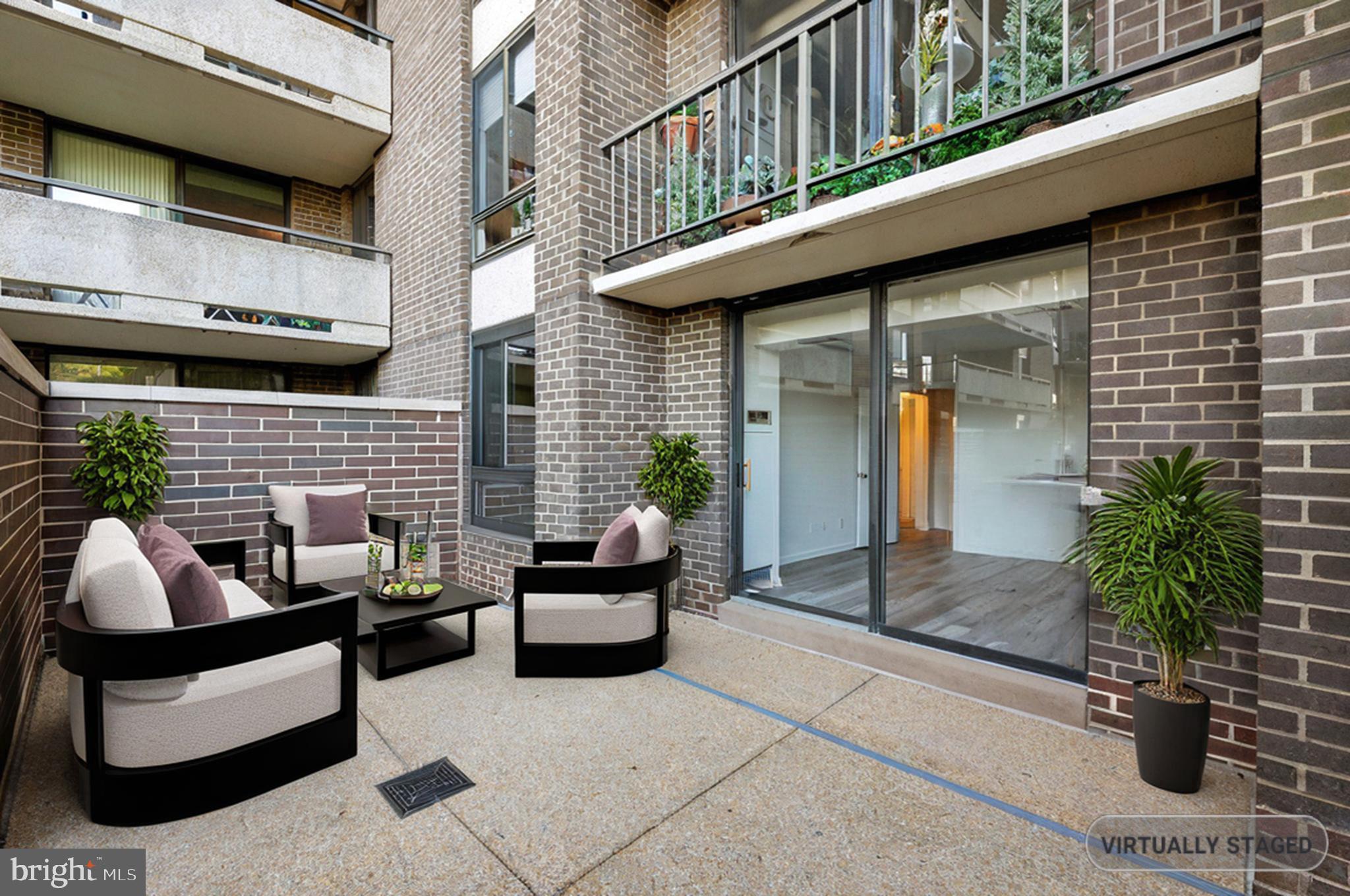 1800 Old Meadow Road, Unit 115 McLean, VA 22102 - Photo 31 of 35 a view of house with outdoor seating space