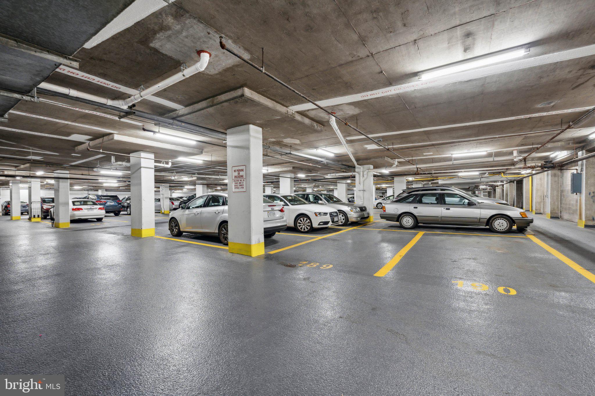 1800 Old Meadow Road, Unit 115 McLean, VA 22102 - Photo 34 of 35 a view of parking area with parked cars