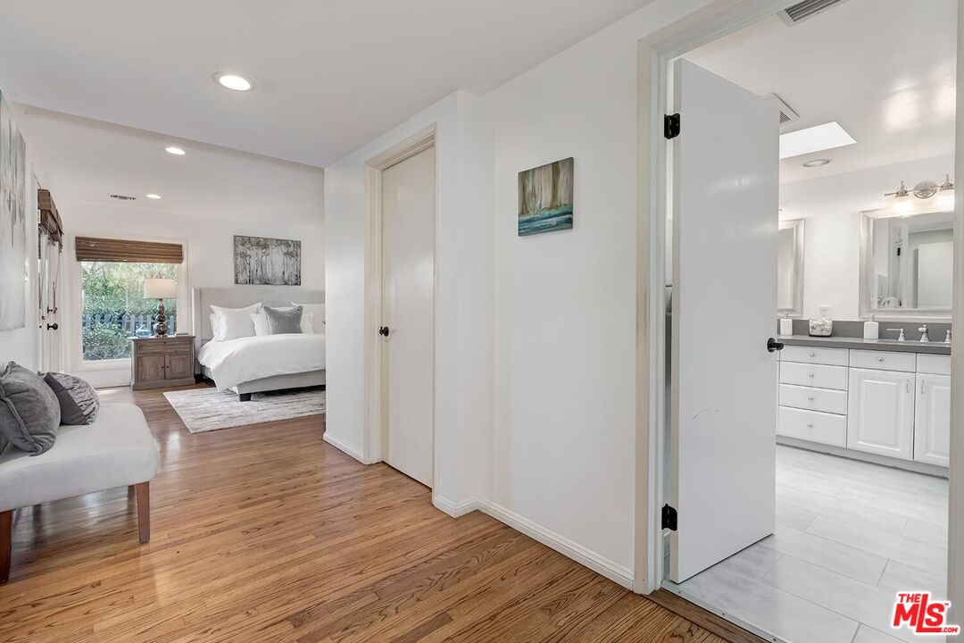 751 Teakwood Road Los Angeles, CA 90049 - Photo 26 of 46 a living room with furniture and a table